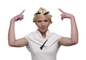 Woman sectioning blonde hair into four parts for Wella ColorCharm toner application
